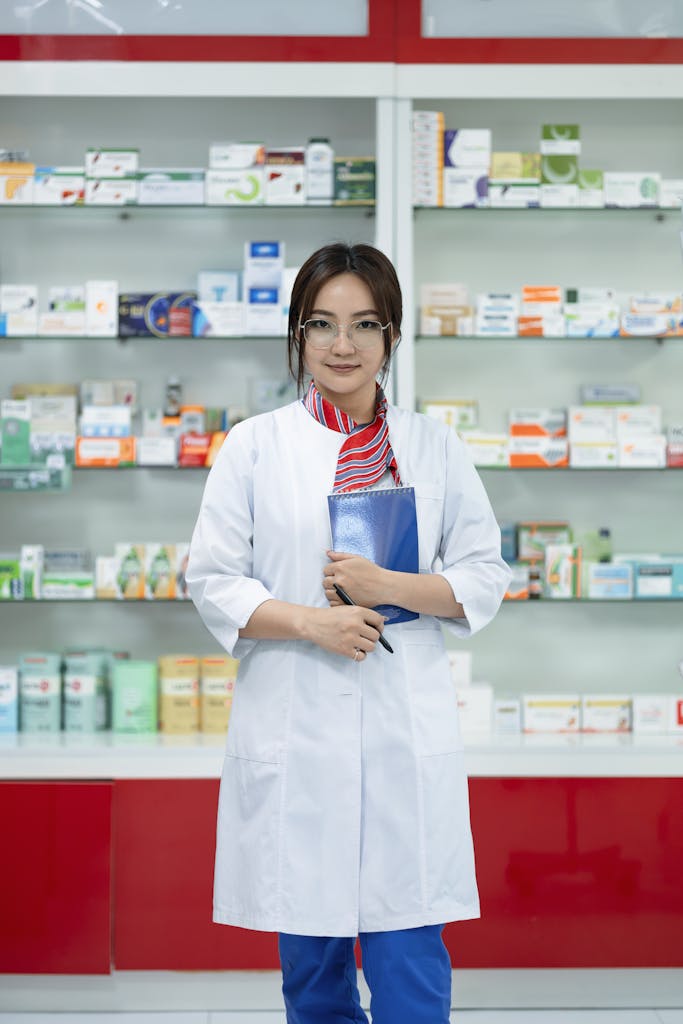 Young Pharmacist in Drugstore